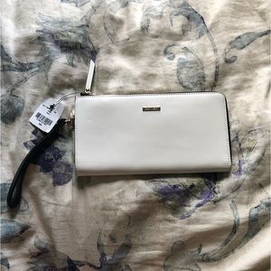 Danier leather wallet with removable strap in white